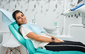 Young woman in dentist’s chair 