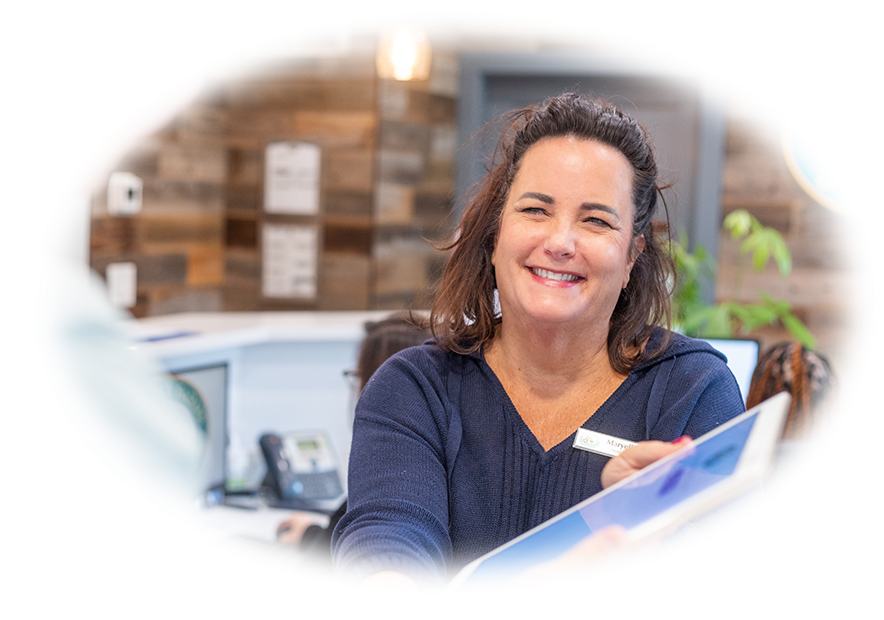 Woman smiling in Beverly dental office